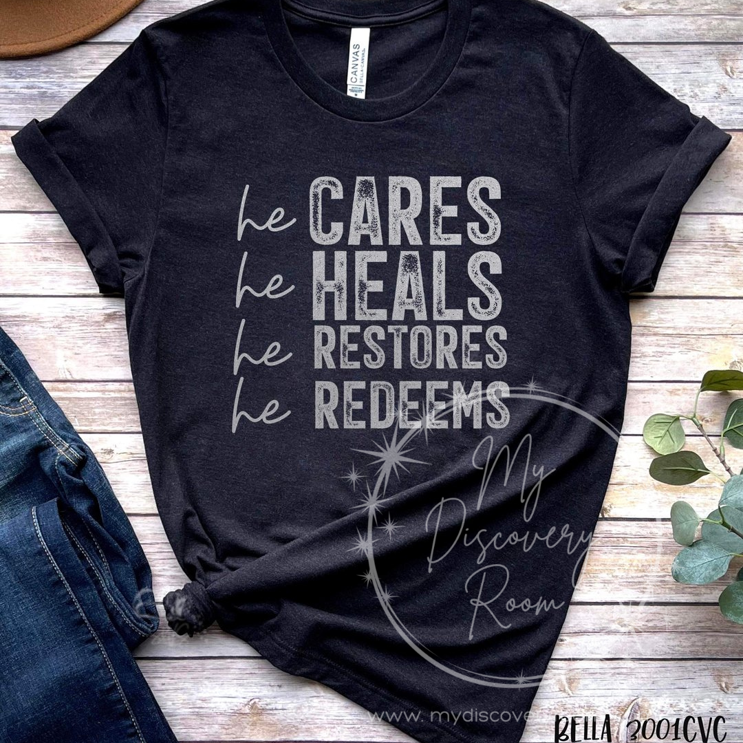 He Heals, Cares, Restores, & Redeems Graphic Tee