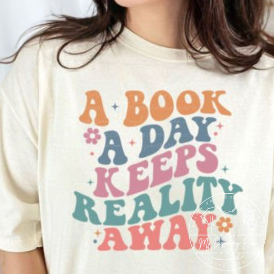 A Book A Day Keeps Reality Away Graphic Tee