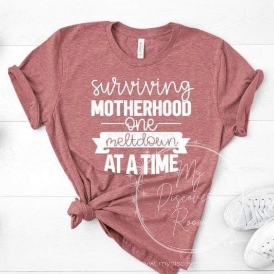 Surviving Motherhood One Meltdown At A Time (Style 2) Graphic Tee